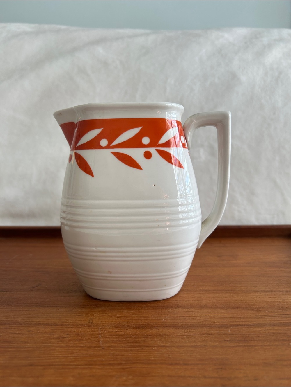 White Ceramic Pitcher with Orange Leaf Band